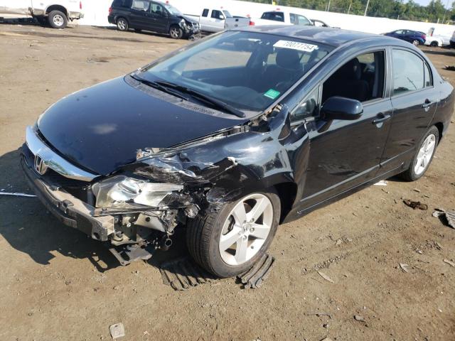 HONDA CIVIC LX-S 2011 with VIN 2HGFA1F66BH534984 - Photo from auction