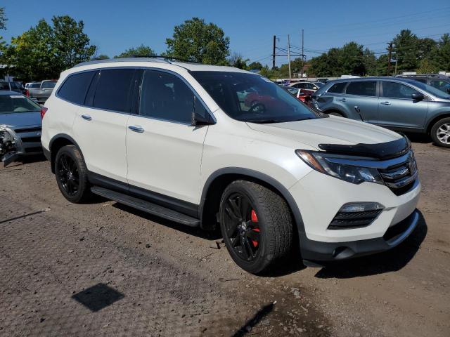 Photo 4 from auction – 2017 HONDA PILOT ELIT with VIN 5FNYF6H00HB001557