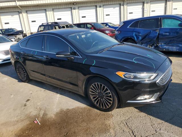 Photo 4 from auction – 2018 FORD FUSION TIT with VIN 3FA6P0D99JR218945