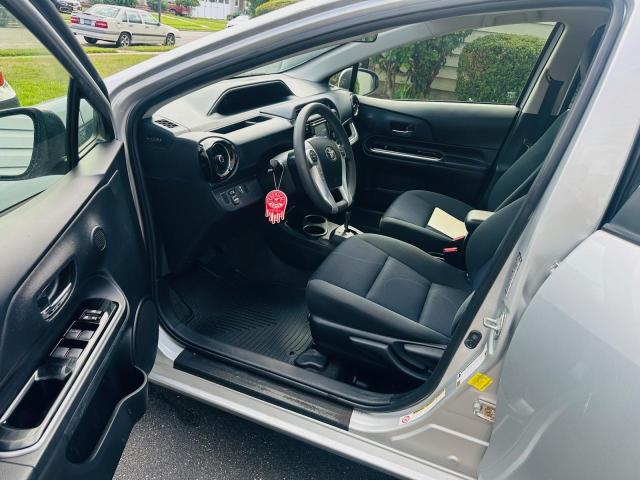 Photo 5 from auction – 2015 TOYOTA PRIUS C with VIN JTDKDTB35F1097673