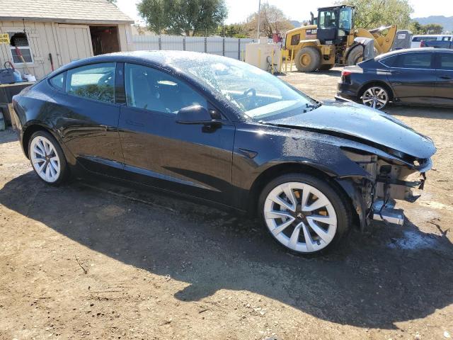 Photo 4 from auction – 2022 TESLA MODEL 3 with VIN 5YJ3E1EAXNF288530