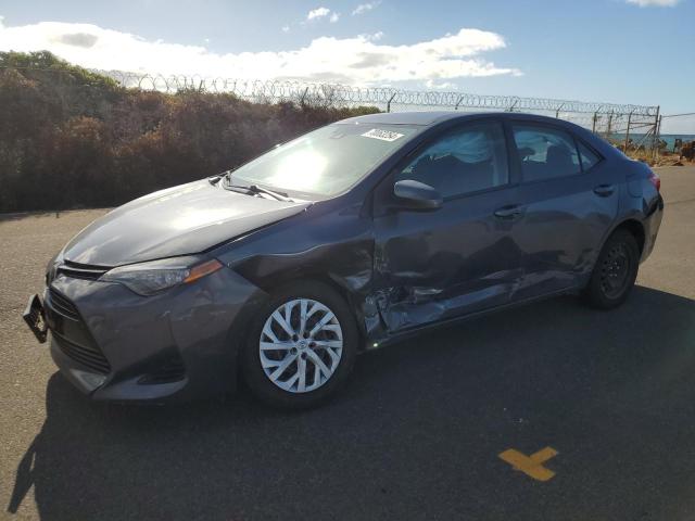 TOYOTA COROLLA L 2017 with VIN 5YFBURHEXHP590758 - Photo from auction