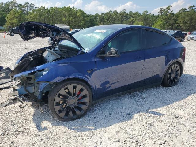 TESLA MODEL Y 2023 with VIN 7SAYGDEF1PF712342 - Photo from auction