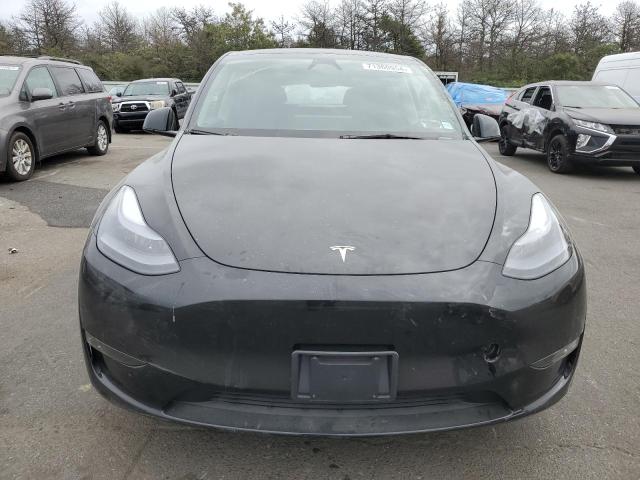 Photo 5 from auction – 2023 TESLA MODEL Y with VIN 7SAYGDEE2PA181415