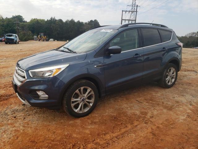 FORD ESCAPE SE 2018 with VIN 1FMCU0GD7JUB46041 - Photo from auction