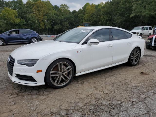 AUDI A7 PREMIUM 2016 with VIN WAUWGAFC0GN060447 - Photo from auction