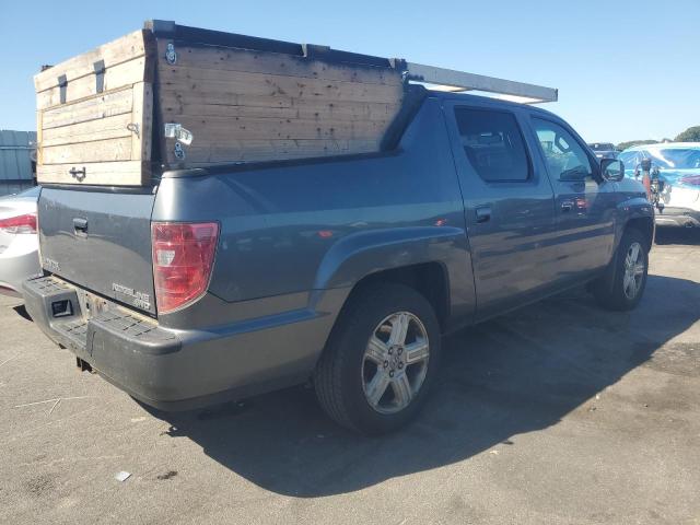 Photo 3 from auction – 2011 HONDA RIDGELINE with VIN 5FPYK1F52BB455000