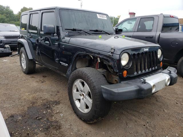 Zdjęcie 4 z aukcji – 2011 JEEP WRANGLER U z VIN 1J4BA5H10BL560158