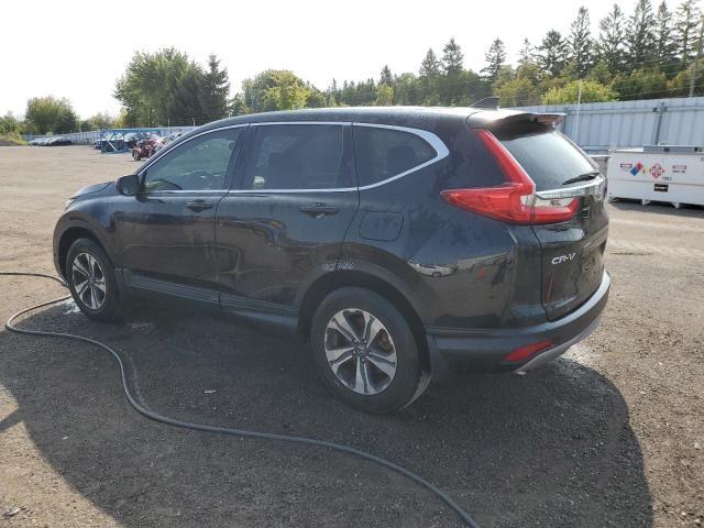 Photo 2 from auction – 2019 HONDA CR-V LX with VIN 2HKRW2H22KH102011