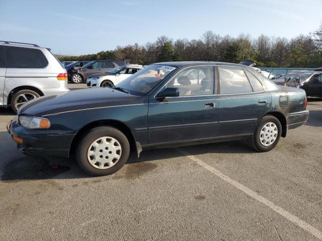 TOYOTA CAMRY LE 1995 with VIN 4T1SK12E2SU574365 - Photo from auction