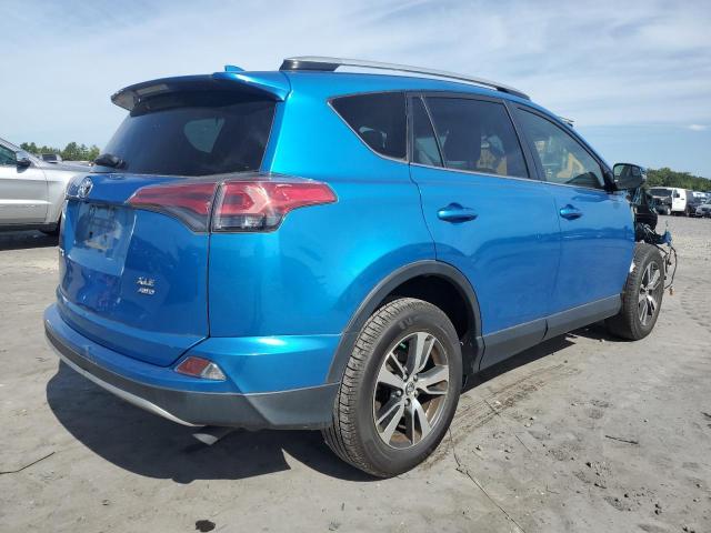 Photo 3 from auction – 2016 TOYOTA RAV4 XLE with VIN JTMRFREV7GD182572
