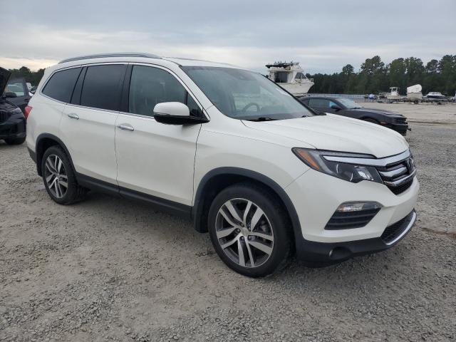 Photo 4 from auction – 2017 HONDA PILOT ELIT with VIN 5FNYF6H03HB056908