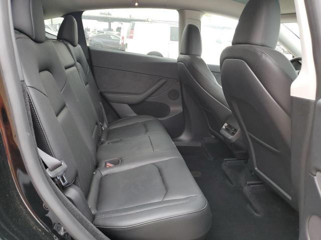 Photo 10 from auction – 2023 TESLA MODEL Y with VIN 7SAYGDEE8PF862827