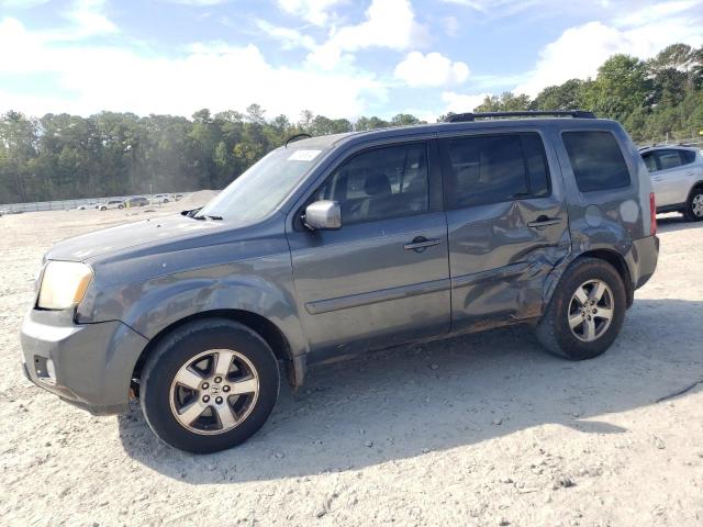 HONDA PILOT EXL 2010 with VIN 5FNYF3H67AB002990 - Photo from auction