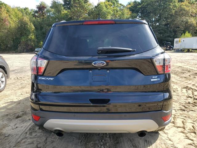 Photo 6 from auction – 2017 FORD ESCAPE SE with VIN 1FMCU9GD5HUD47368
