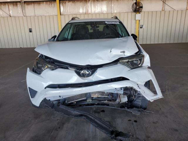 Photo 5 from auction – 2017 TOYOTA RAV4 LE with VIN 2T3ZFREV6HW395582