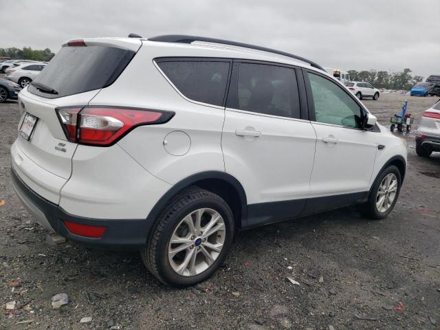 Photo 3 from auction – 2018 FORD ESCAPE SE with VIN 1FMCU9GD1JUB74843