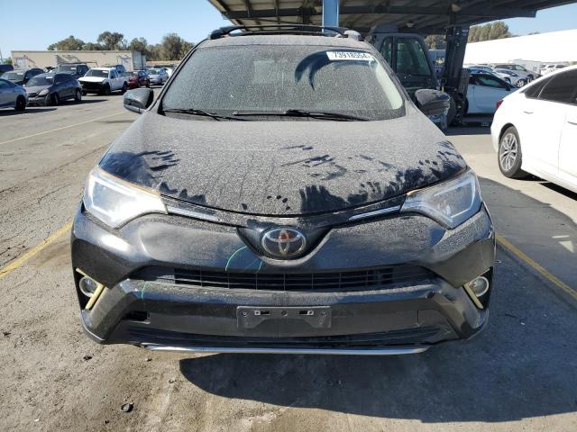 Photo 5 from auction – 2018 TOYOTA RAV4 LE with VIN 2T3BFREV8JW810344