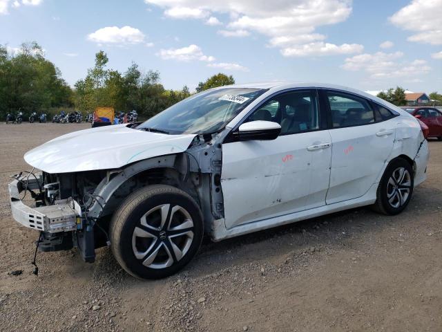 HONDA CIVIC LX 2017 with VIN 2HGFC2F57HH540647 - Photo from auction