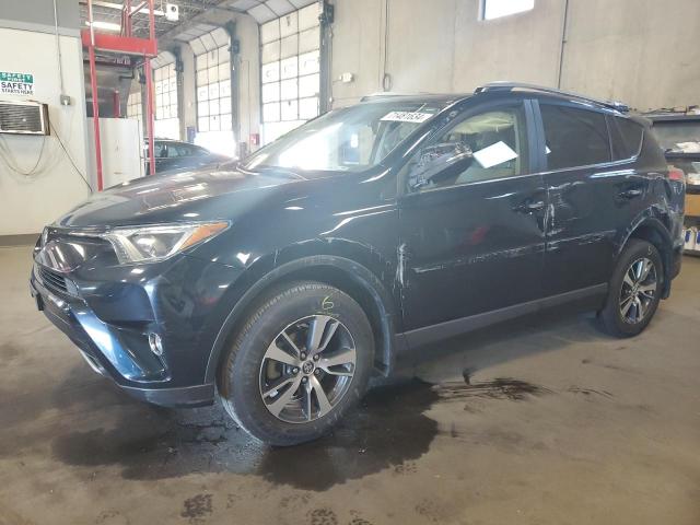 TOYOTA RAV4 XLE 2017 with VIN JTMRFREV8HD219145 - Photo from auction