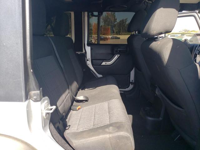 Photo 10 from auction – 2011 JEEP WRANGLER U with VIN 1J4HA6H18BL501472