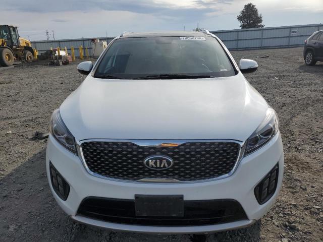 Photo 5 from auction – 2016 KIA SORENTO SX with VIN 5XYPKDA14GG059287