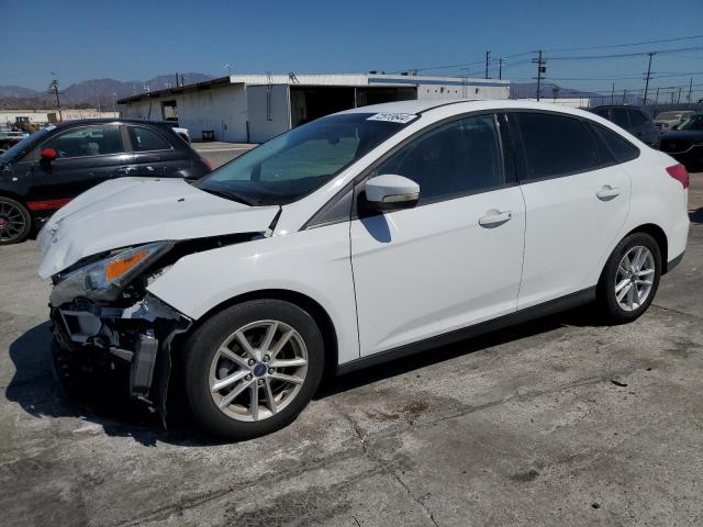 FORD FOCUS SE 2017 with VIN 1FADP3F20HL271518 - Photo from auction