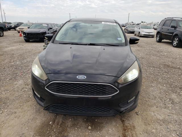Снимка 5 от търг – 2016 FORD FOCUS SE с VIN 1FADP3F25GL397341
