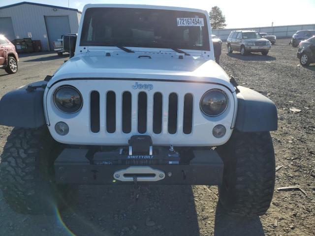 Photo 5 from auction – 2016 JEEP WRANGLER U with VIN 1C4BJWDG1GL289818