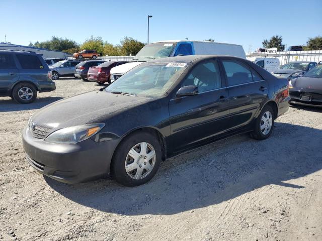 TOYOTA CAMRY LE 2002 with VIN JTDBE32K820064851 - Photo from auction