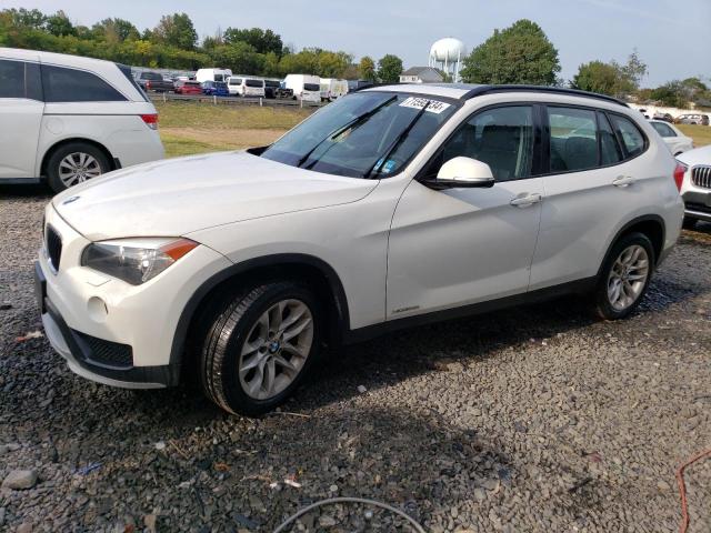 BMW X1 XDRIVE2 2015 with VIN WBAVL1C5XFVY30892 - Photo from auction
