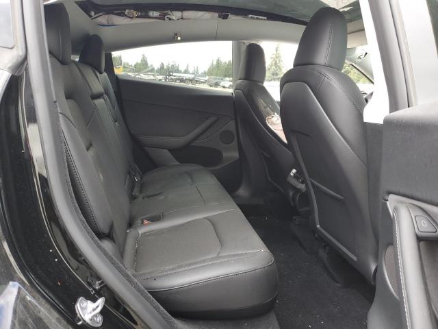 Photo 11 from auction – 2023 TESLA MODEL Y with VIN 7SAYGDEE6PF939078