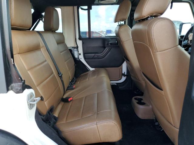 Photo 10 from auction – 2011 JEEP WRANGLER U with VIN 1J4BA5H19BL543259