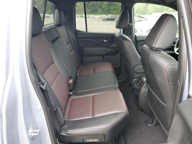 Photo 10 from auction – 2023 HONDA RIDGELINE with VIN 5FPYK3F80PB062058