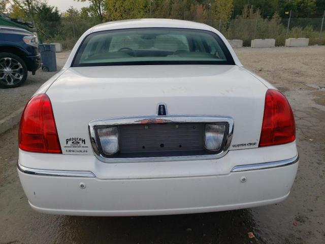 Photo 6 from auction – 2004 LINCOLN TOWN CAR E with VIN 1LNHM81W04Y681871