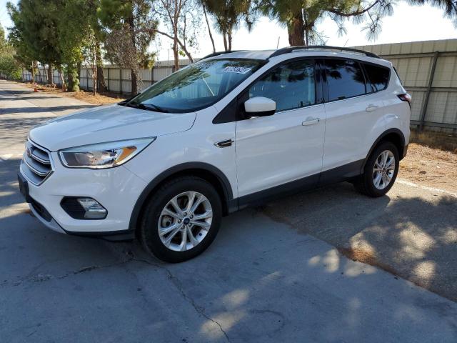 FORD ESCAPE SE 2018 with VIN 1FMCU9GD8JUB60728 - Photo from auction