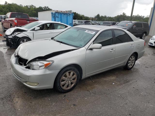TOYOTA CAMRY LE 2003 with VIN 4T1BF30K53U055918 - Photo from auction