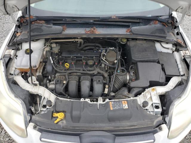 Photo 11 from auction – 2014 FORD FOCUS SE with VIN 1FADP3F28EL336272
