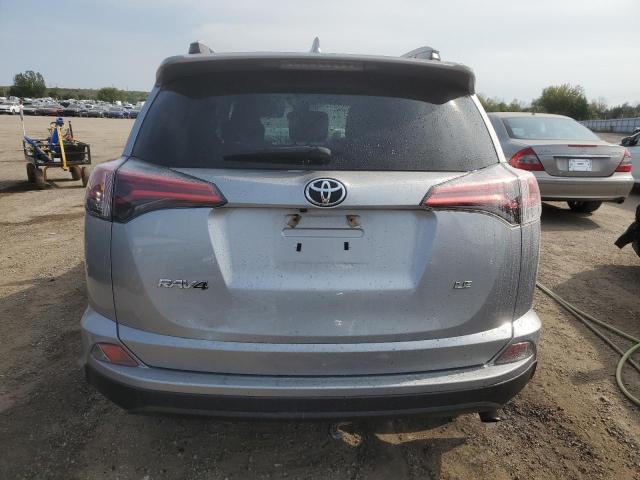 Photo 6 from auction – 2018 TOYOTA RAV4 LE with VIN 2T3ZFREV9JW482754