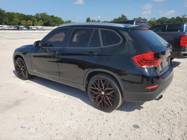 Photo 2 from auction – 2015 BMW X1 SDRIVE2 with VIN WBAVM1C55FVW56999