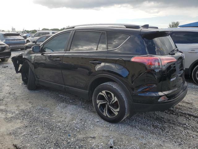 Photo 2 from auction – 2018 TOYOTA RAV4 LE with VIN 2T3ZFREV7JW469050