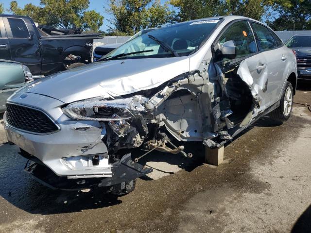 FORD FOCUS SE 2018 with VIN 1FADP3F2XJL312128 - Photo from auction