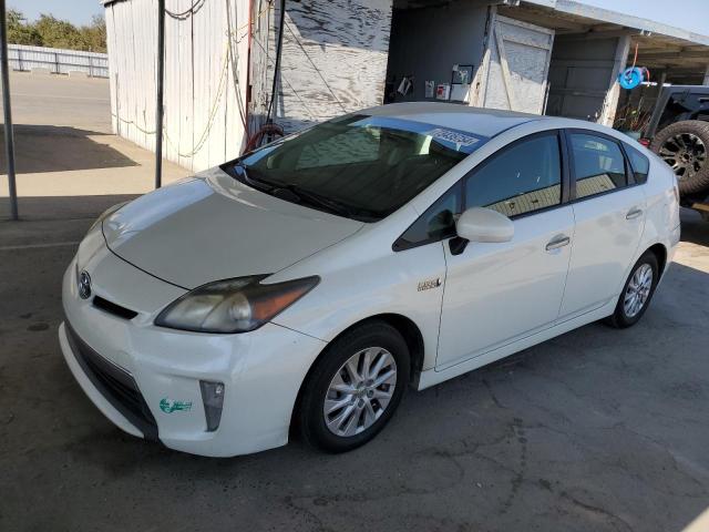 TOYOTA PRIUS PLUG 2012 with VIN JTDKN3DP3C3009054 - Photo from auction