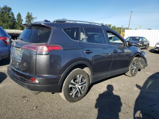 Photo 3 from auction – 2018 TOYOTA RAV4 LE with VIN JTMBFREV7JJ747459