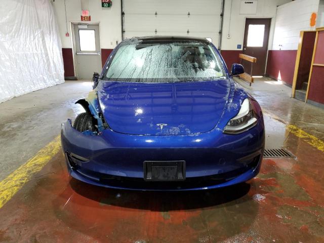 Photo 5 from auction – 2022 TESLA MODEL 3 with VIN 5YJ3E1EAXNF370726