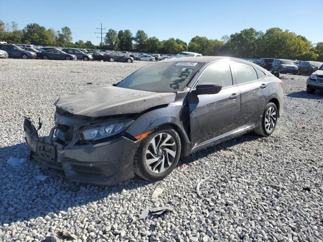HONDA CIVIC EX 2017 with VIN 19XFC2F77HE046039 - Photo from auction