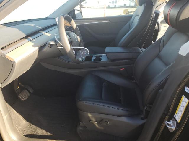 Photo 7 from auction – 2023 TESLA MODEL Y with VIN 7SAYGDEE1PF827580