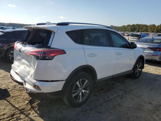 Photo 3 from auction – 2017 TOYOTA RAV4 XLE with VIN JTMRFREV0HJ704655