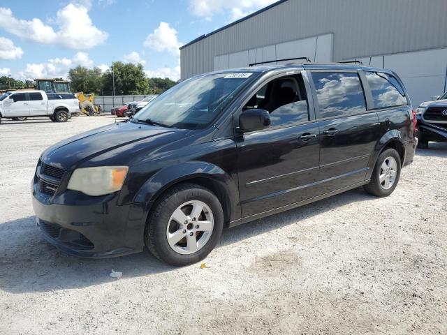 DODGE CARAVAN 2013 with VIN 2C4RDGCG9DR582365 - Photo from auction