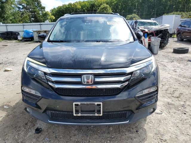 Photo 5 from auction – 2017 HONDA PILOT TOUR with VIN 5FNYF5H95HB026995